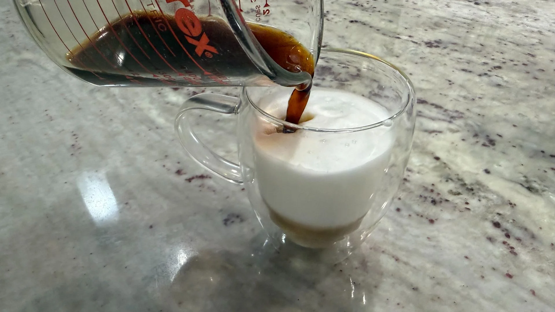 Braun OptiBrew Pro coffee shot and frothed milk