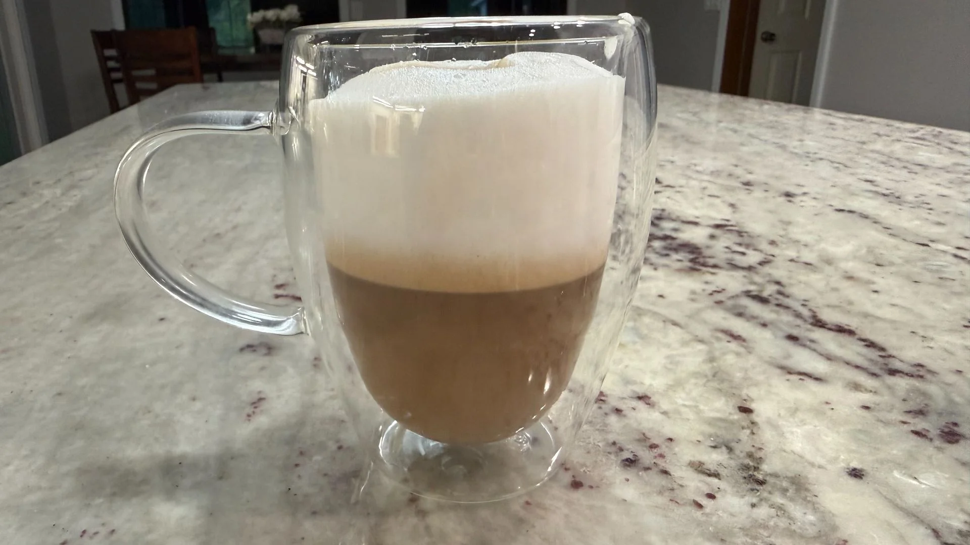 Braun OptiBrew Pro coffee shot and frothed milk
