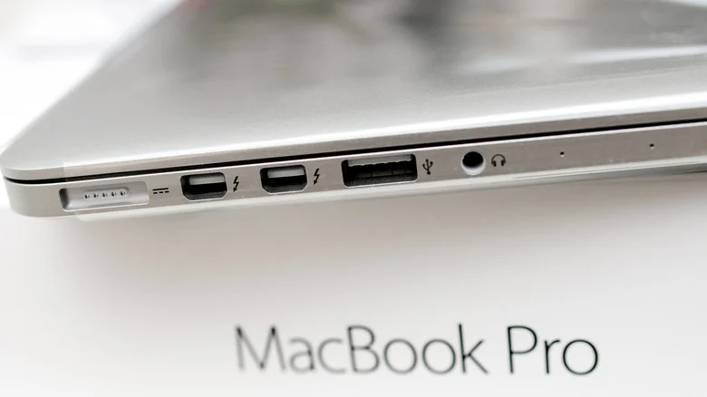 Side view of an older MacBook pro, showing Thunderbolt Mini DisplayPort ports alongside other ports.