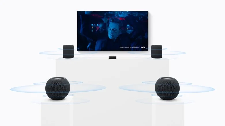 A pair of HomePod mini 2 and a pair of HomePod 2 paired with an Apple TV to create a surround sound system.