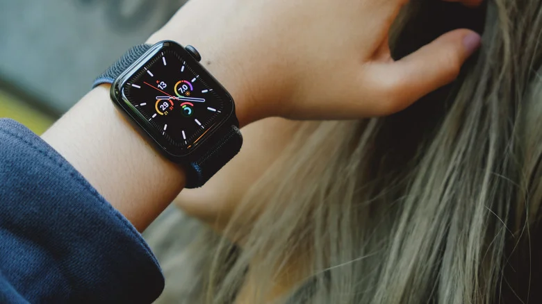 Close-up picture of an Apple Watch on a person's wrist, showing its watch face.