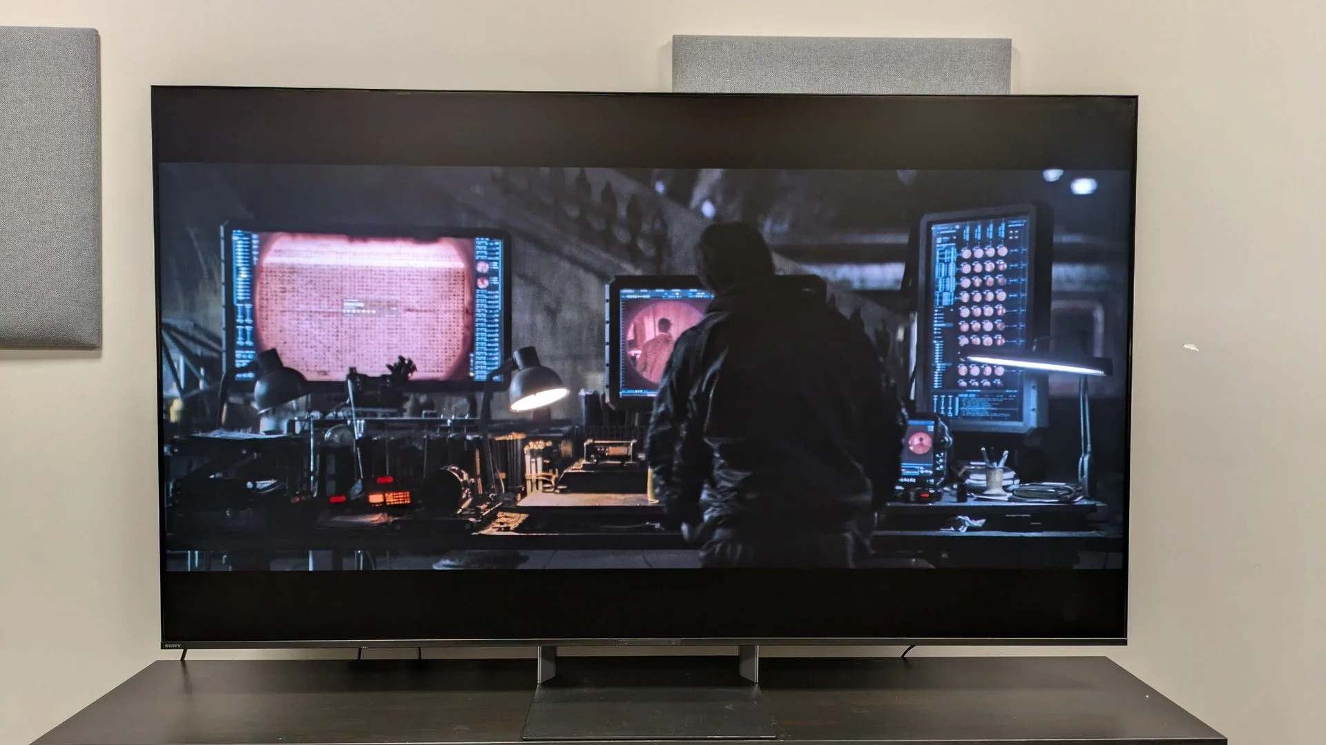 Sony Bravia 9 II with a shot of Bruce in the Batcave from The Batman on screen. The TV shows great contrast even in bright conditions